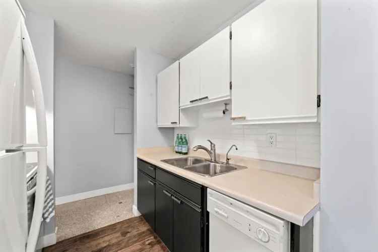 Deerwood Court 1-Bedroom Condo Near Transit and Shopping