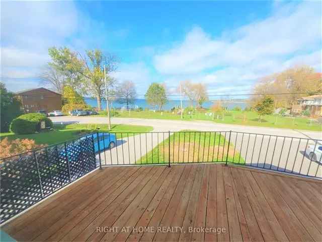 Unobstructed Lake View 2 Bedroom Upper Unit with Large Deck