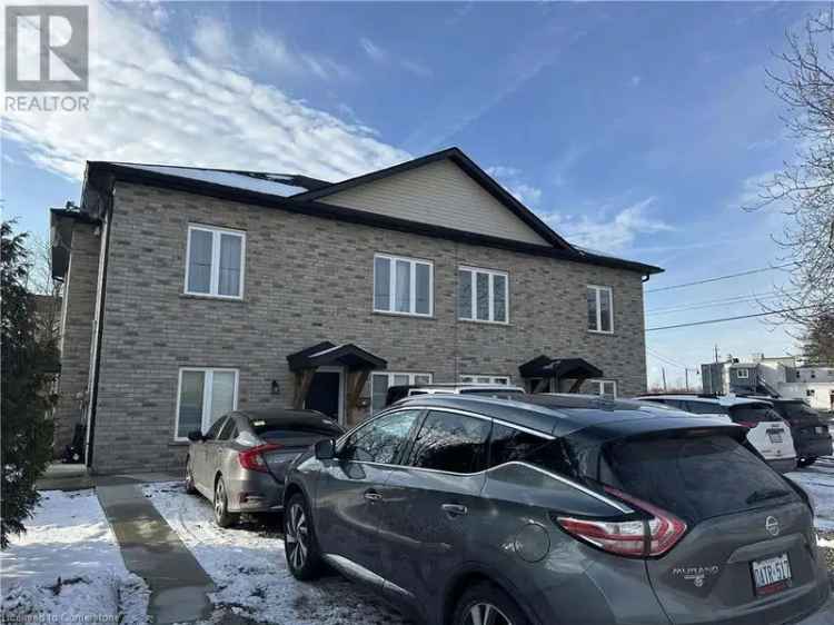 Port Colborne All-Brick Fourplex Investment Opportunity