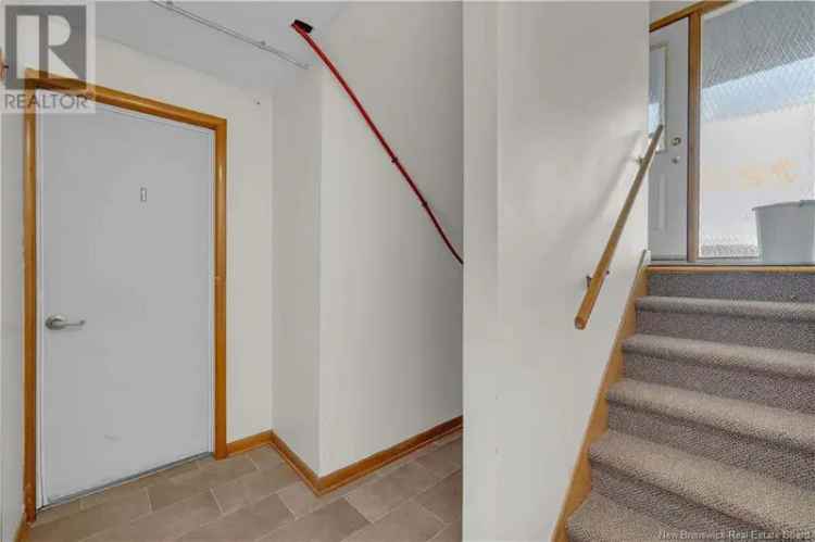 Triplex with 5 Bay Garage Near Rockwood Park