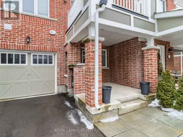 Buy Freehold Townhome in River Mills with Balcony and Open Concept