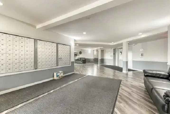 TWO BEDROOM CONDO WITH TITLED UNDERGROUND PARKING