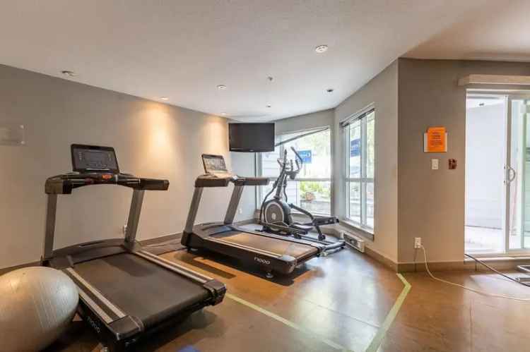 Bright 1 Bedroom + Den Condo in Quattro Complex