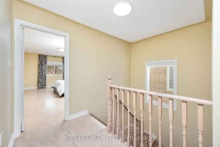 4-Bedroom Family Home with Finished Basement and Landscaped Backyard