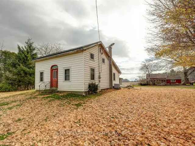 50 Acre Farm with Custom Bungalow and Second Farmhouse