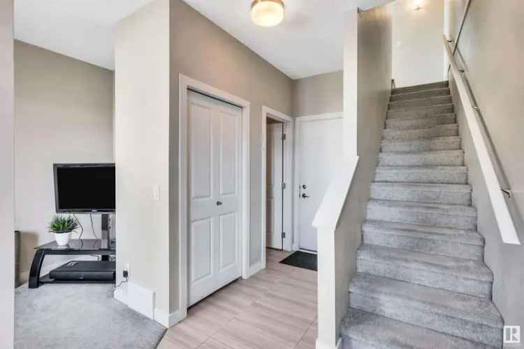 Buy End Unit Townhouse in Griesbach with Park Views and Modern Features