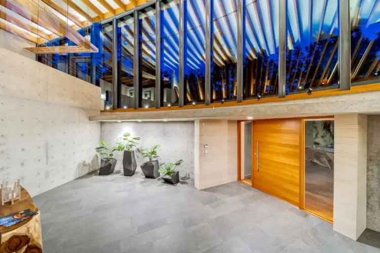 Inside a $18.6M Home Next Door to Bowen Island's Famous Lighthouse