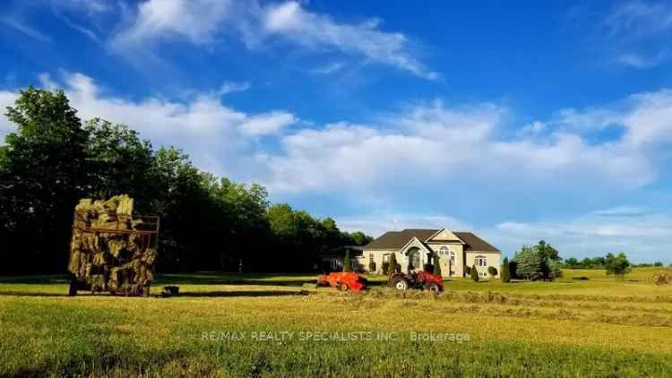 10.8 Acres Bungalow with 1200 Sqft Workshop and 3 Car Garage