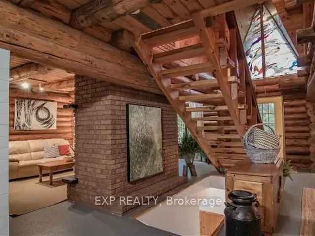 Mountaintop Log Home with Custom Features and Acre of Privacy