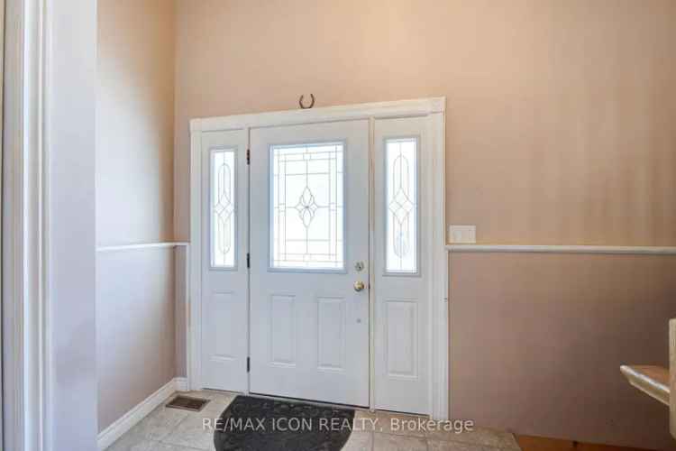 Beachfront Raised Bungalow with Modern Amenities and Double Garage