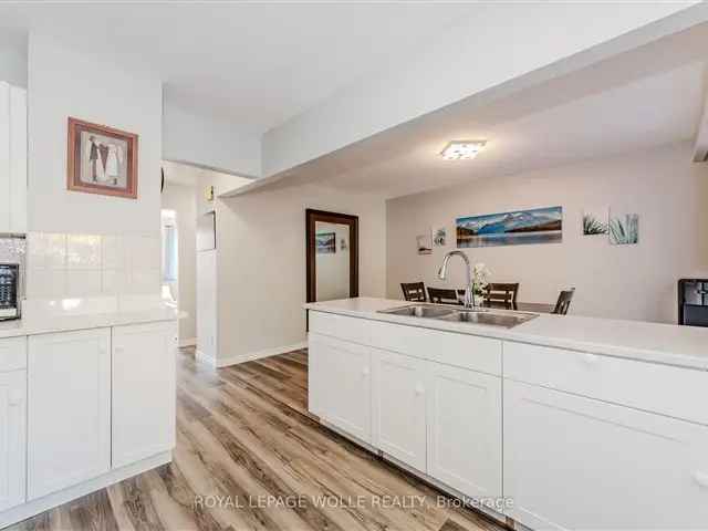 Family-Friendly Freehold Townhouse with Updated Kitchen and Backyard