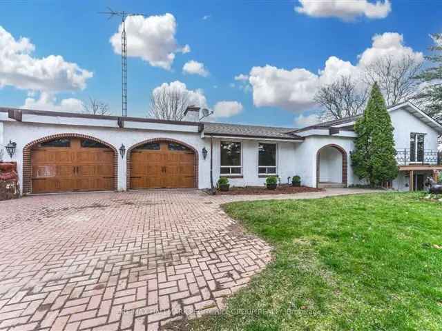 Secluded 25-Acre Bungalow with Two Ponds and Large Barn