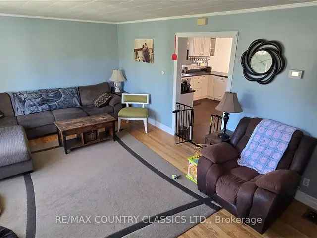 4 Bedroom 2 Bathroom Home with Detached Garage and Large Lot