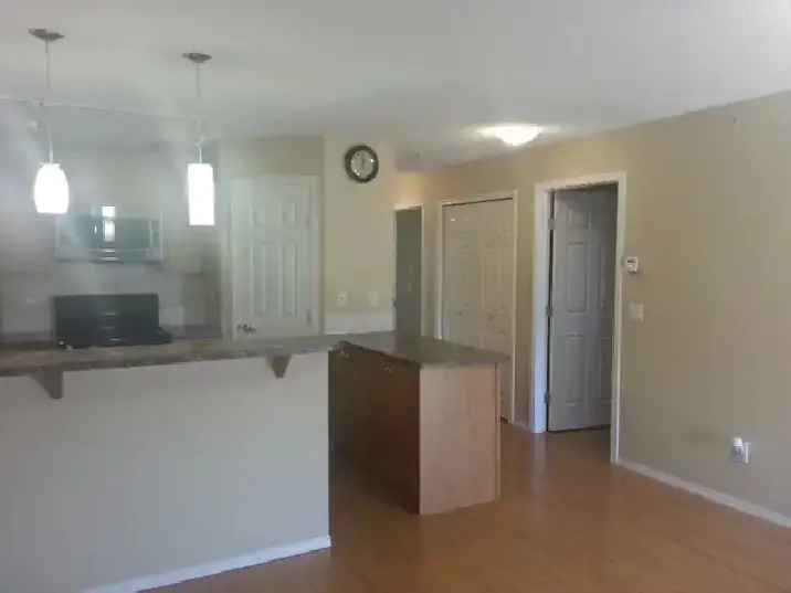 Rent 2 Bedroom Condo in Airdrie with Ensuite and Spacious Living Area