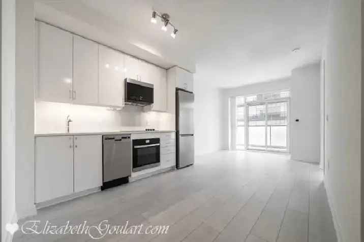 Water's Edge Condo 1 Bedroom Den with Parking