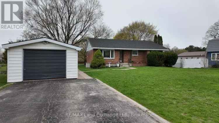 Updated 4-Bedroom Bungalow on 0.5+ Acre Lot Near Downtown