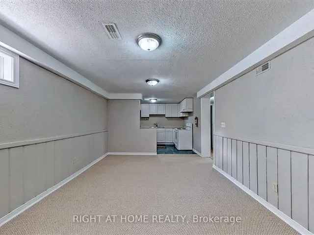 Clean Spacious Basement Apartment Near Upper Canada Mall