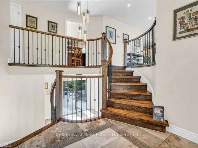 Breslau Oasis: Updated 4-Bedroom Home with Workshop and Stunning Gardens