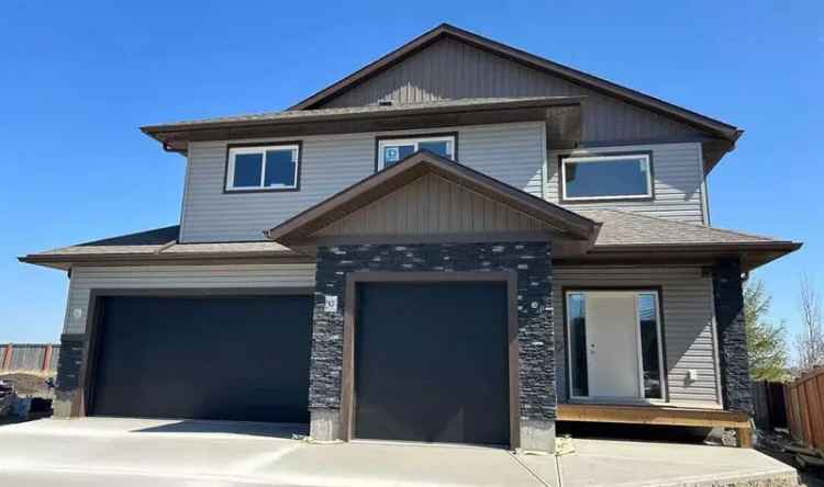3 Bed 2 Bath Modified Bilevel with Triple Garage and Park Backing