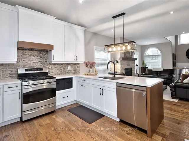 Stunning Renovated Home Cathedral Ceilings Open Concept Main Floor New Kitchen Luxurious Suite