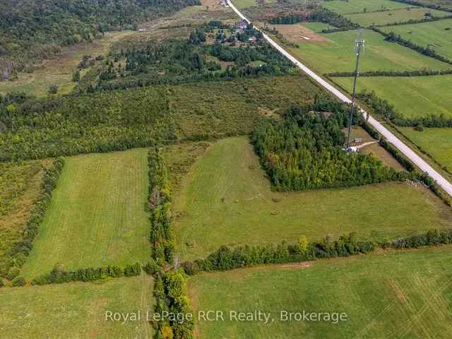 193 Acres with Farmhouse Barn and Ravine