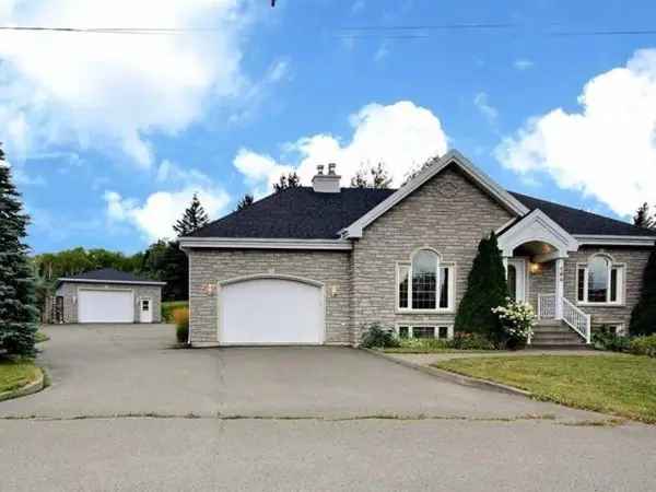 5-Bedroom Bungalow on 41 Acres with 2 Garages Near Riviere-du-Loup