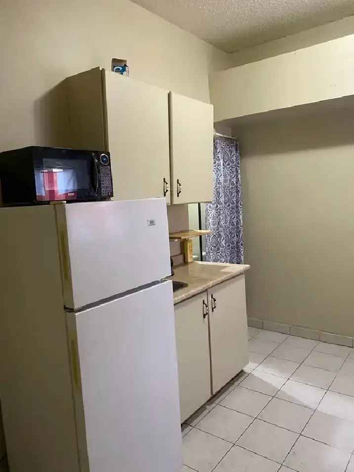 movein now CenterSt16Ave studio private bathroom older man