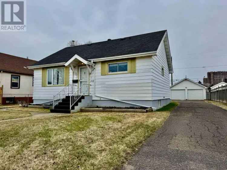 Affordable Bungalow with Big Backyard and Double Garage
