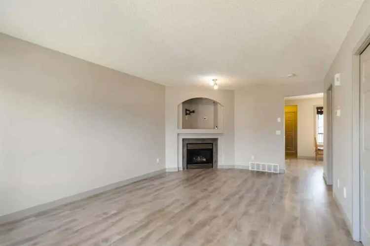 4 Bed 3 Bath Home with Legal Suite & Future Garage Pad