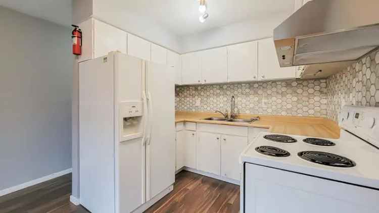 3-Bedroom Townhouse Near Skytrain - Investment Opportunity