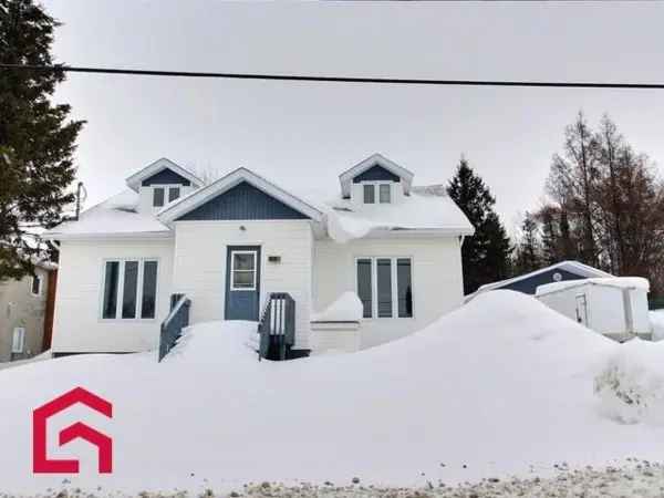 4-Bedroom 1.5-Storey House with Wooded Lot and Garage