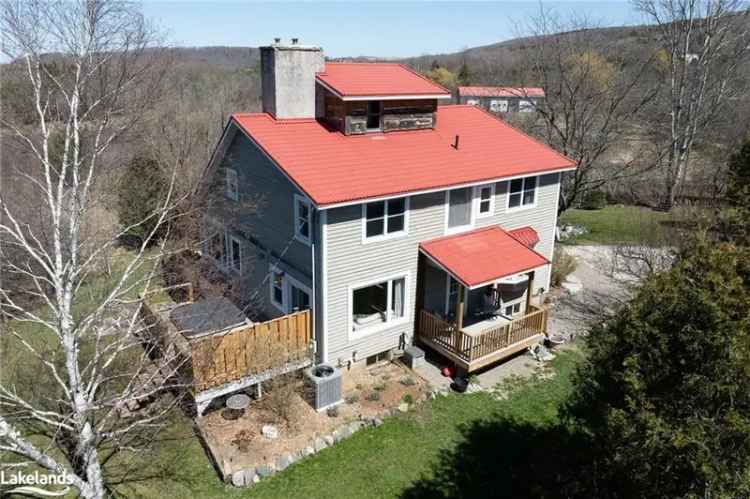 Buy house in Pretty River Valley with stunning views and modern updates