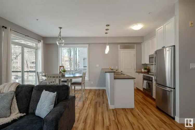Bright End Unit Condo with Updated Kitchen and Amazing Walkability