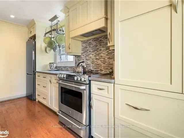 Beautifully Updated Low Maintenance Home with Chef's Kitchen and Updated Basement