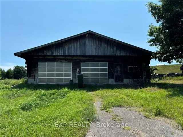 11-Acre Property with Industrial Coverall and Barn