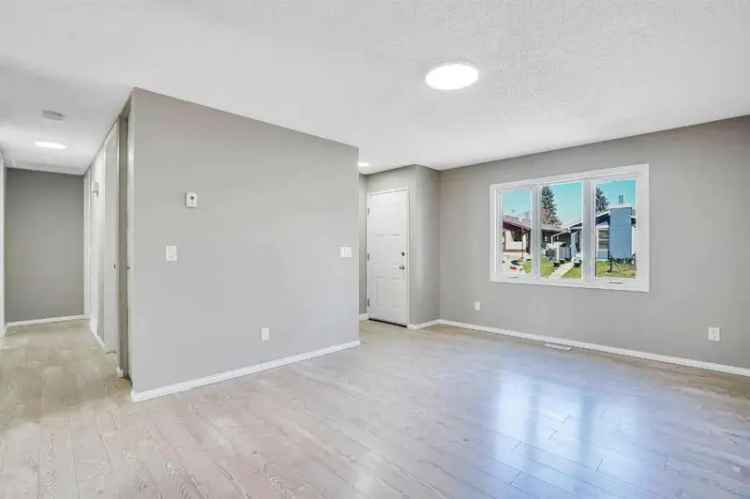 Bright Bungalow with Legal Basement Suite 3 Bed 1.5 Bath