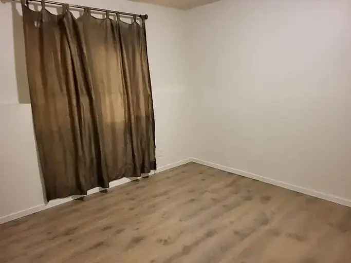 Rent 3 Bedroom 2 Story Unit in Calgary with Cozy Living Area