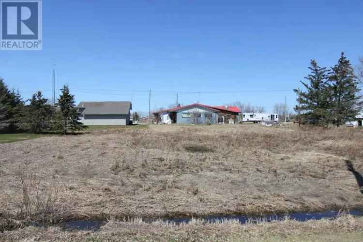 Large Building Lot in Quiet Town Setting Near Amenities