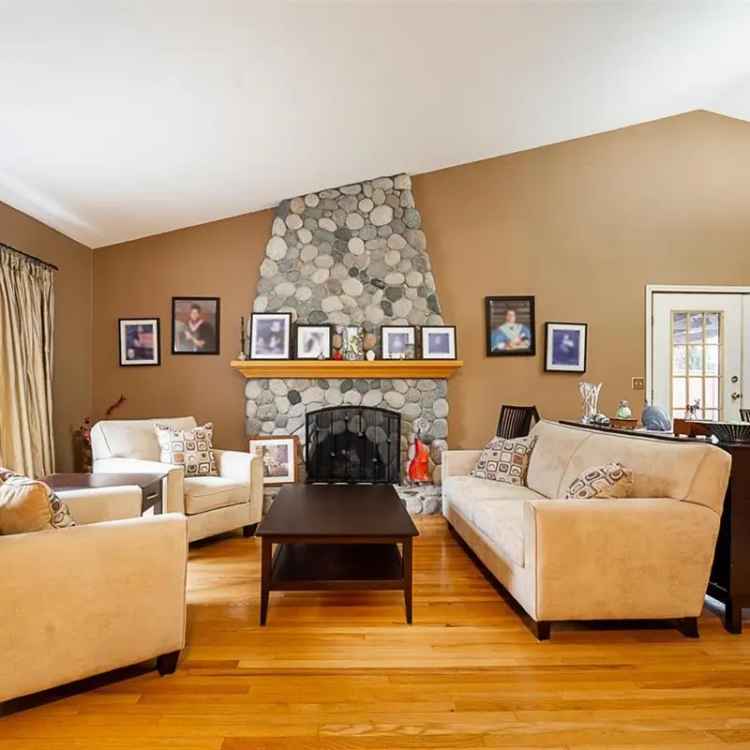 House for Sale in Chimney Hills: Spacious Home with Private Yard and Basement Suite