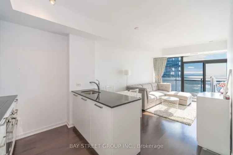 Lake View Luxury Condo with Spacious Den and Balcony