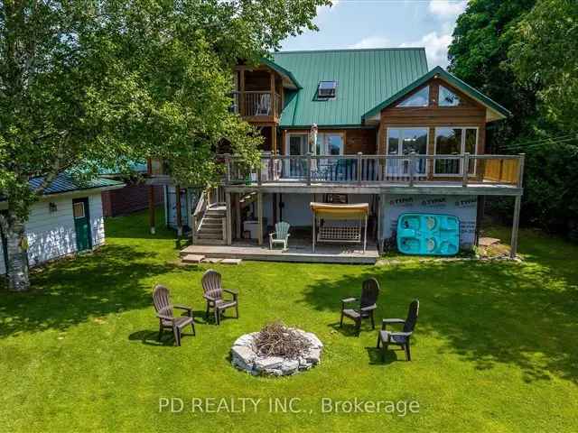 Stunning Waterfront Retreat with Two Homes on Sturgeon Lake