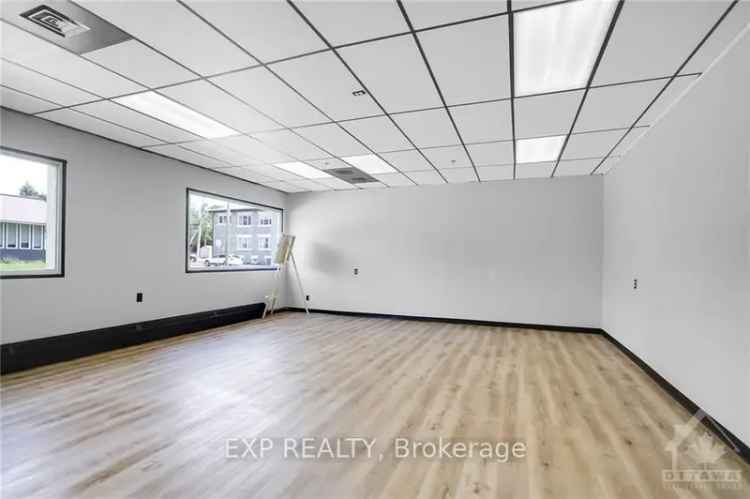 Renovated Commercial Property High Ceilings Versatile Zoning Garage Bay