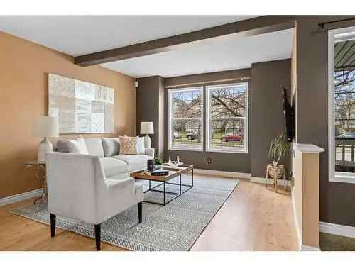 3 Bedroom Walkout Home in Hidden Valley with EV Charger and Suite Potential