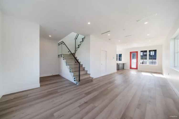 New 3-Bedroom Home with Legal Suite & Laneway House