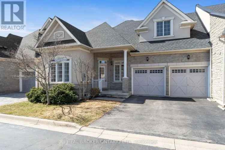 Executive Freehold Bungalow Townhome in Prestigious Enclave