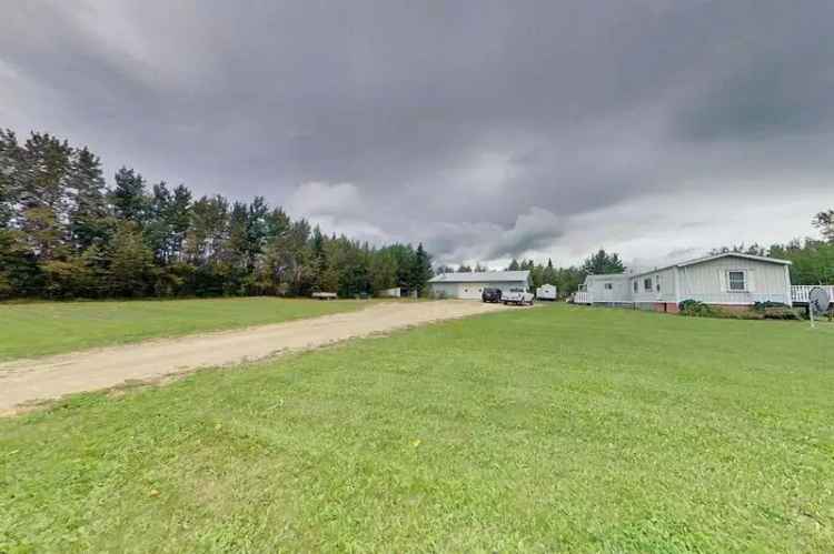 2.45 Acre Property with Large Garage and Spacious Yard