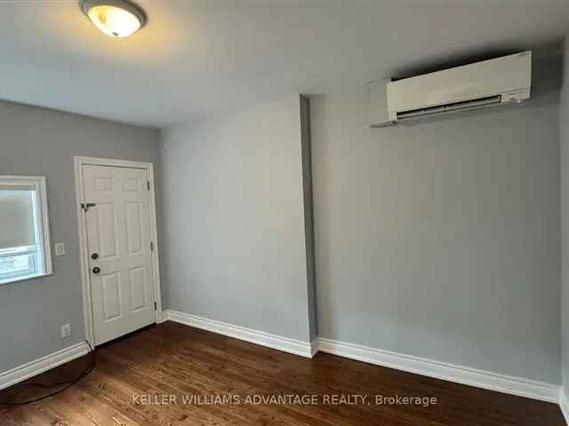 Bright Danforth Ave Apartment - Modern Kitchen Hardwood Floors