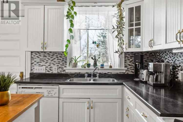 Historic 4-Bedroom Home on 5.4 Acres with Updated Amenities