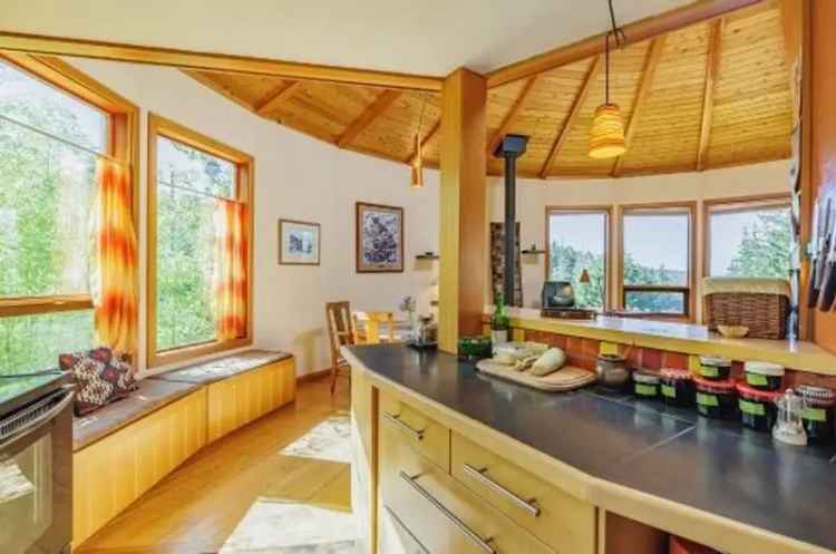 Custom Home for Sale on Mayne Island with Unique Round Design and Scenic Surroundings