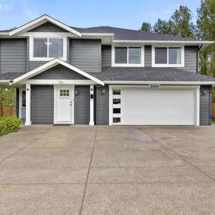 4-Bedroom 3-Bathroom Home with Legal Suite Near Park